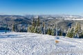 Beautiful panoramic view over the `Marisel` ski slope in winter season and Belis lake in the valley, Cluj county Romania
