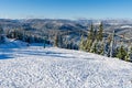 Beautiful panoramic view over the `Marisel` ski slope in winter season and Belis lake in the valley, Cluj county Romania Royalty Free Stock Photo