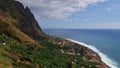Small fishing village Paul do Mar on the coast of Madeira, Portugal with banana plantations and steep cliffs.