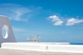 Romantic table set-up in Santorini Greece. White architecture and table for two. Love concept in romantic travel destination Royalty Free Stock Photo