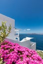 White architecture on Santorini island, Greece. Beautiful summer landscape, sea view, vivid flowers, luxury resort Royalty Free Stock Photo