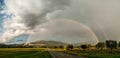 Beautiful panoramic view of a rainbow over Assisi town Umbria, Italy Royalty Free Stock Photo