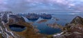 Beautiful panoramic view from Reinebringen edge on stunning mountains and village of Reine, Lofoten Islands, Norway Royalty Free Stock Photo