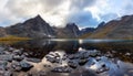 Beautiful Panoramic View of Rugged Mountains and Alpine Lake Royalty Free Stock Photo