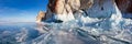 Winter landscape of frozen Baikal Lake with icy rocks Olkhon Island, panoramic view Royalty Free Stock Photo