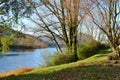 Beautiful panoramic view to the Adda river and riverbank near Lecco in a sunny day. Royalty Free Stock Photo