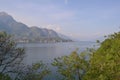 Beautiful panoramic view to the lake Como, lakefront, motorboat moving.