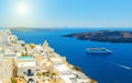 Beautiful panoramic view from touristic Fira town to caldera and volcano at summer sunny day. SantoriniThira island.