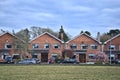 Beautiful panoramic view of traditional typical Irish suburban red brick wall houses with cutted lawn grass near Ballawley Park