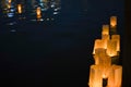 Beautiful paper lanterns floating on water, lake view