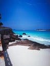 Beautiful paradise tropical beach with trees, white sand, granite rocks and turquoise water,