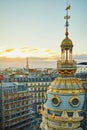 Beautiful Parisian skyline with roofs and dramatic sunset