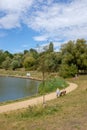 Beautiful park, couple sitting and enjoying the view.