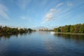 Beautiful park lanscape: river, blue sky and trees