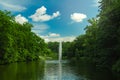 Beautiful park nature landscape picturesque photography of scenic view with pond reservoir fountain and forest of green trees Royalty Free Stock Photo