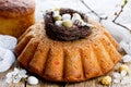 Beautiful paska or kulich Easter bread decorated bird nest