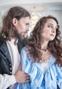 Beautiful passionate couple woman and man in medieval clothes Royalty Free Stock Photo