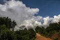 Beautiful path in tropical landscape with amazing cloudy blue sky, huge white cloud, Chiang Mai, North Thailand Royalty Free Stock Photo