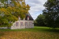 Beautiful patrimonial two-chimneyed stone presbytery seen in the fall in Deschambault-Grondines