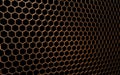 Beautiful pattern of bronze mesh on a black background Royalty Free Stock Photo
