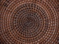 Beautiful pattern on handmade woven basket. Detail of wicker artwork background with circle structure. Texture of round Royalty Free Stock Photo