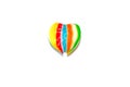 Single heart shaped lollipop in rainbow color isolated on white background.