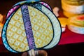 Beautiful pattern on Thai native fan made from bamboo for sale in the local market. Royalty Free Stock Photo