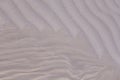 A beautiful pattern of white sand on a beach of Baltic Sea. Royalty Free Stock Photo