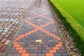 Beautiful pavement of red and brown clinker brick. Walking path Royalty Free Stock Photo