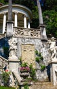 Beautiful pavilion with the ancient sculptures in the botanical garden of Villa Monastero, Varenna, Italy. Royalty Free Stock Photo