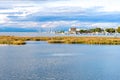 Beautiful and peaceful evening over the small sea harbour with blue clouds and coast line Royalty Free Stock Photo