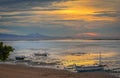 Beautiful Peaceful Sunrise with Juking boats at Sanur beach in Bali, Indonesia Royalty Free Stock Photo