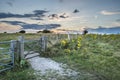 Beautiful peaceful sunset landscape image over English rolling c