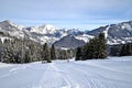 Beautiful peaceful winter landscape in the Frence Alps, at one of the ski stations, France. The view on the empty ski slopes