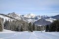 Beautiful peaceful winter landscape in the Frence Alps, at one of the ski stations, France. The view on the empty ski slopes