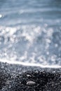 Beautiful pebble beach, small wave. Adler. Sochi. Royalty Free Stock Photo