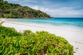 Beautiful Petite Anse beach at Mahe Island, Seychelles. Blue ocean lagoon and white sand tropical beach on holiday Royalty Free Stock Photo