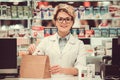 Beautiful pharmacist at work