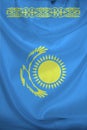 Beautiful photo of a colored national flag of the modern state of Kazakhstan on a textured fabric, concept of tourism, emigration