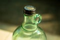 Green antique bottles and reflex light.