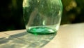 Green antique bottles and reflex light.