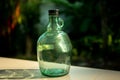 Green antique bottles and reflex light.