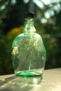 Green antique bottles and reflex light.