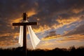 Beautiful photo illustration of brilliantly colorful Easter morning sunrise with a large wooden cross, burial cloth and crown of t