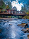 High resolution photo of a rusty bridge over a river Royalty Free Stock Photo