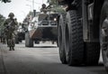 Soldiers and armored vehicles enter the city