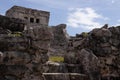 Beautiful photo of the Tulum castle, this is a mayan ruin located on the Tulum beach along the Riviera Maya being visited by many Royalty Free Stock Photo