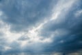 View of the sky. The sky is covered with clouds with glimmers of sunlight. Royalty Free Stock Photo