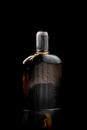 Beautiful photography of black perfume product with water splash