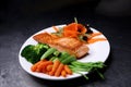 Grilled salmon fillet with fresh vegetable salad  full plate Royalty Free Stock Photo